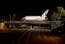 Space Shuttle Endeavour passes over the  freeway Photo from the LA Times x