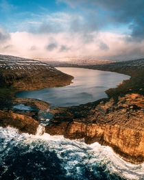 Srvgsvatn emptying into the sea Faroe Islands 