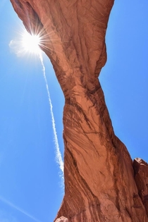 Standing underneath a arch in Arches National Park Utah OC x