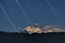 Startrail over Kanchenjunga It rained for almost two days without a hint of blue skies but on the third day I got a small window to capture Kanchenjunga  m  under Moonlight  Mount Kanchenjunga was considered as the highest peak of the world until Gangtok 