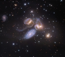 Stephans Quintet - Four of these five galaxies are locked in a cosmic dance of repeated close encounters taking place some  million light-years away 