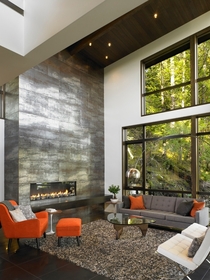 -Story Metallic Fireplace in Contemporary Waterfront Hideaway  Gambier Island BC Canada Turkel Design 