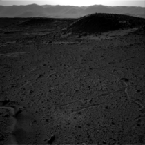Strange flash of light near the top of the dark hill on the left side of the image captured on Mars by NASAs Curiosity rover on April   NASA says it is either a glinty rock or a vent-hole light leak in the camera housing 