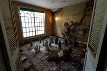 Stumbled across these statues in an otherwise empty abandoned home 