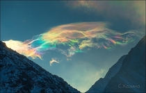 Stunning iridescent clouds snapped above skies of Siberias Belukha mountain