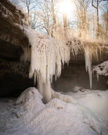 Sun illuminates the ice formations around Carpenter falls in Moravia NY 
