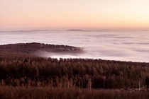 Sunrise and Fog over the city from a mountain next to Kassel Germany 