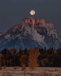 Sunrise and full moonset in the Tetons in October late fall x 