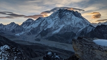 Sunrise behind the Lhotse-Nuptse Massif as seen from halfway up Lobuche Peak 