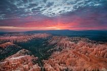 Sunrise colors storm clouds over Bryce Canyon as seen from Bryce Point Photo by Lonnie Shull 