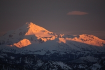 Sunrise over Glacier Peak from southwest of Stevens Pass USA 
