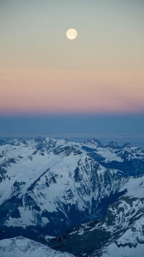 Sunrise snow mountains and the moon Taken from Schilthorn Switzerland 