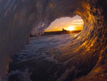 Sunrise through a wave in Santa Cruz CA 