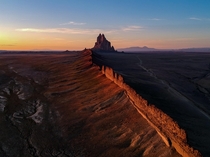 Sunset at Shiprock Ts Bita in Navajo a volcanic peak rising above the desert in northwestern New Mexico USA 
