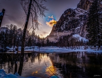 Sunset over frozen Merced River Yosemite National Park February 