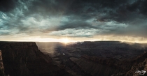 Sunset shining through the rain at the Grand Canyon South Rim 