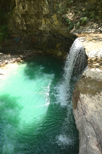 Surprisingly emerald waterfall in suburban Columbus Ohio 