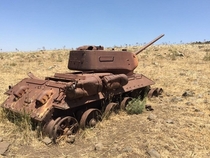 Syrian T-- abandoned in the Golan Heights after it fell to enemy fire in 