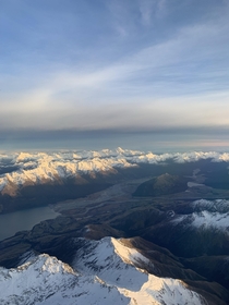 Taken from a plane to ZQN one of the most scenic approaches in the world Looking west toward Lake Wakatipu and the Southern Alps of New Zealand 