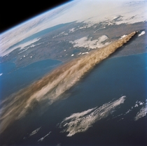 The ash plume from the eruption of the Kliuchevskoi Volcano in the Kamchatka peninsula seen from the Space Shuttle Endeavour in Oct  - 