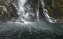 The base of Stirling Falls at Milford Sound South Island New Zealand 