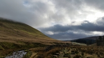 The beautiful yet gloomy view of Pen Y Fan Mountain Wales 