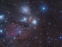 The blue color in NGC  a reflection nebula in the constellation Monoceros is caused by starlight scattering within the cloud and producing the same effect as a clear daytime sky on Earth