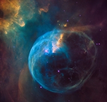 The Bubble Nebula an enormous bubble being blown into space by a super-hot massive star Its seven light-years across - about one-and-a-half times the distance from our sun to its nearest stellar neighbor Alpha Centauri 