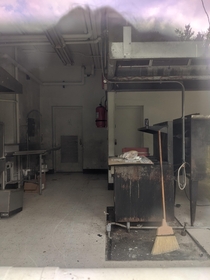 The cafeteria of an abandoned school