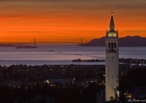 The Campanile Tower in Berkeley and the Golden Gate Bridge in the distance 