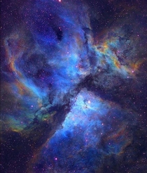 The carina nebula is  light years away from earth Its home to some extremely young and massive stars