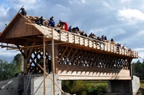 The community constructing some cool new infrastructure Building a covered wooden bridge in Jruska Estonia 