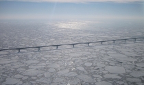 The Confederation Bridge surrounded by an ice pack near Borden-Carleton PEI 