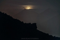 The crescent moon hiding in the volcano of Fuego in Guatemala