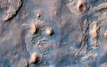 The Curiosity rover as seen by NASAs Mars Reconnaissance Orbiter on April  Exaggerated color image 