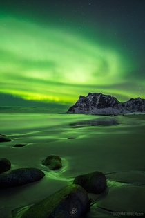 The elusive Aurora Borealis lighting up Uttakleiv beach in Norway Video in comments 