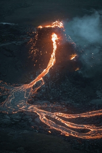 The eruption in Iceland shot from a helicopter It has been spewing up lava at a constant pace for the last  days and could fill up the whole valley in about - days Geldingadalur Iceland  - Instagram thrainnko