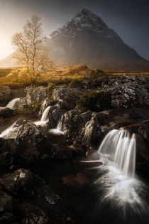 The famous Etive Mor waterfall with beautiful fall colors 