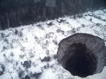The gates of hell have opened in Russia A potash Mine has collapsed in the Perm region leaving behind a gigantic sinkhole in the middle of an abandoned town 