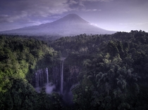 The glorious Tumpak Sewu waterfall tucked away in the jungles of Eastern Java in the shadow of Mt Semeru 