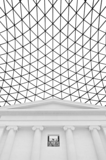 The Great Court of the The British Museum by Foster and Partners  at its connection point to the original South Entrance by Sir Robert Smirke  