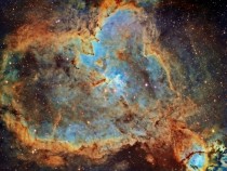 The Heart Nebula It is  light years across and its center hosts the massive hot stars of a newborn star cluster that is only  million years young 