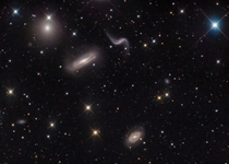 The Hickson  galaxy cluster 