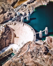 The Hoover dam is a concrete arch gravity dam in Black Canyon of Colorado river situated on border of Nevoda and Arizona