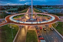 The Hovenring is a suspended bicycle path roundabout on the border between Eindhoven and Veldhoven in the Netherlands It is the first suspended bicycle roundabout in the world 
