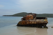 The hulk of a US Army tank rests forgotten on a Caribbean Island 