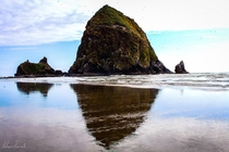 The infamous Haystack Rock reflecting in the summer sun  itkjpeg
