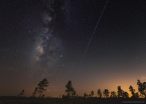 The International Space Station flies alongside the Milky Way as seen from Central Florida yesterday evening 