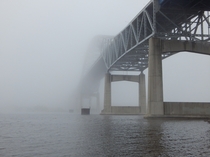 The John A Blatnick Bridge between Superior WI and Duluth MN in heavy fog 