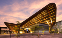 The Kutubu Convention Centre is an iconic yet highly functional design defined by a signature roof inspired by Papua New Guineas traditional timber long houses which form the heart of the countrys rural villages